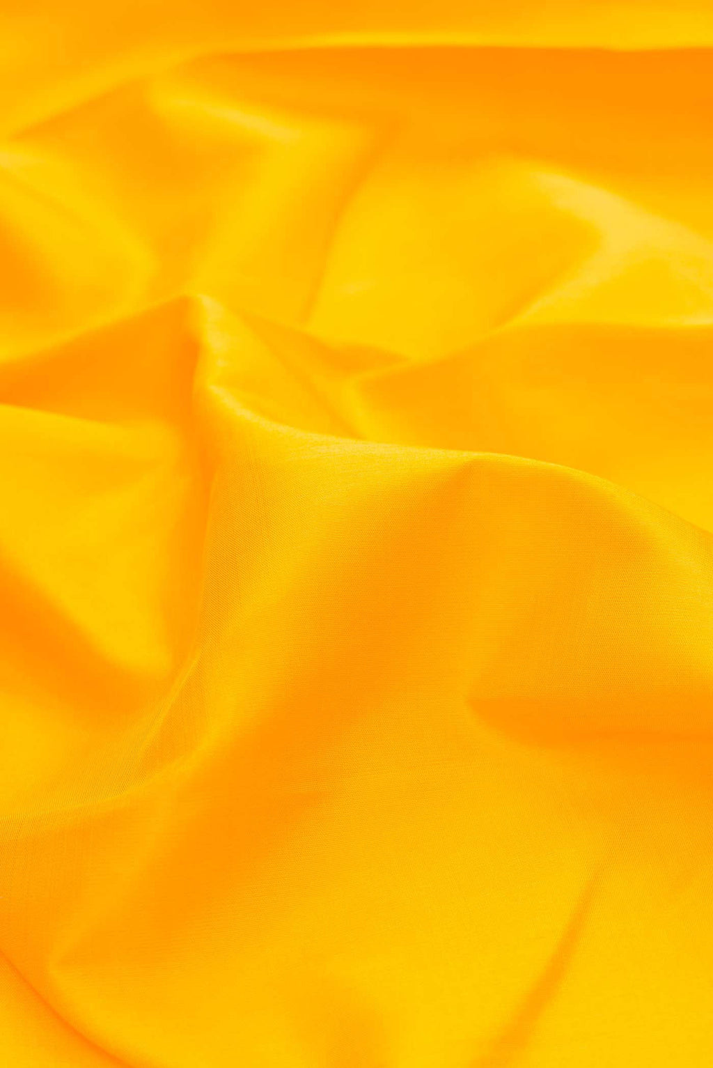 Close up of Yellow Dual Tone Kanchipuram Silk Saree with Plain Body and Temple Border displaying folds