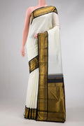Pure Silk Pure Zari White Dual Tone Kanjivaram Saree with Plain Body and Zari Border.  displayed on a mannequin