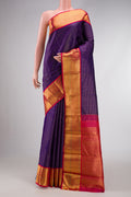 Navy Blue Dual Tone Kanchipuram Silk Saree with Checked design on the body and Zari Border.  displayed on a mannequin