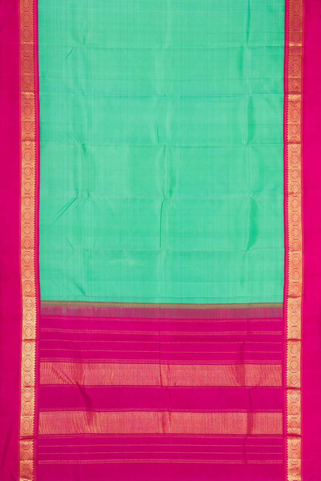 Flat view of Pure Silk Pure Zari Sea Green Dual Tone Kanjivaram Saree with Plain Body and Zari Border. 