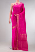 Pink Dual Tone Soft Silk Saree with Zari Butta on the body and Fancy Border.  displayed on a mannequin