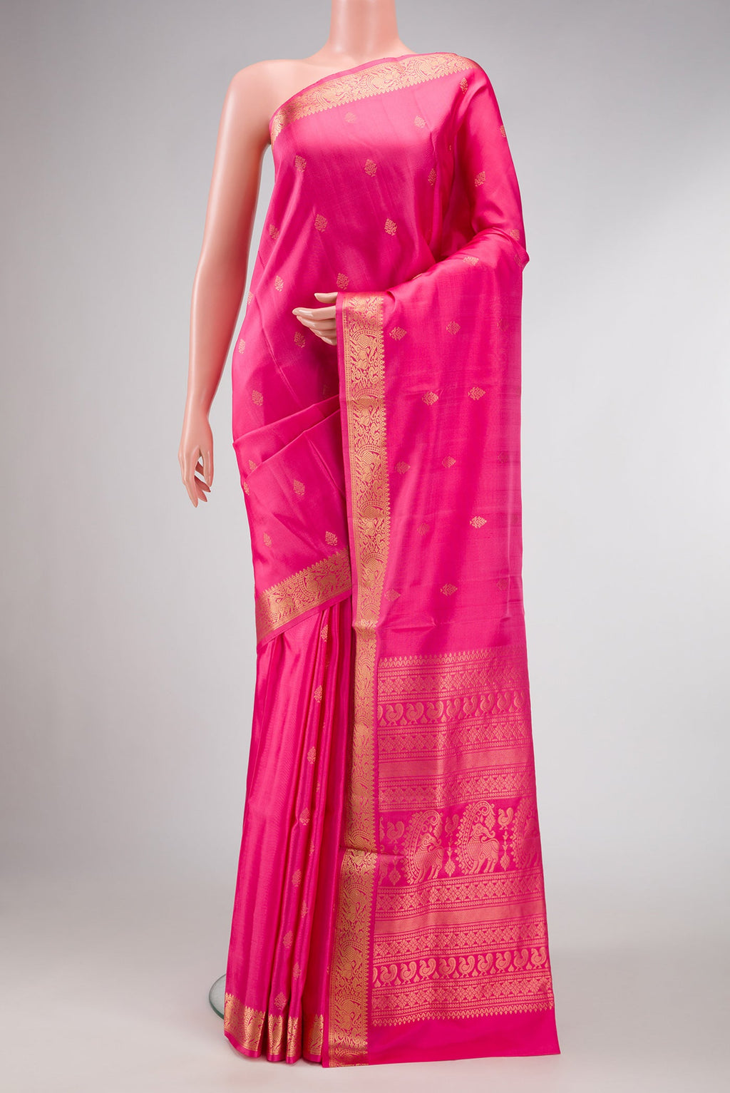 Pink Dual Tone Soft Silk Saree with Zari Butta on the body and Zari Border.  displayed on a mannequin
