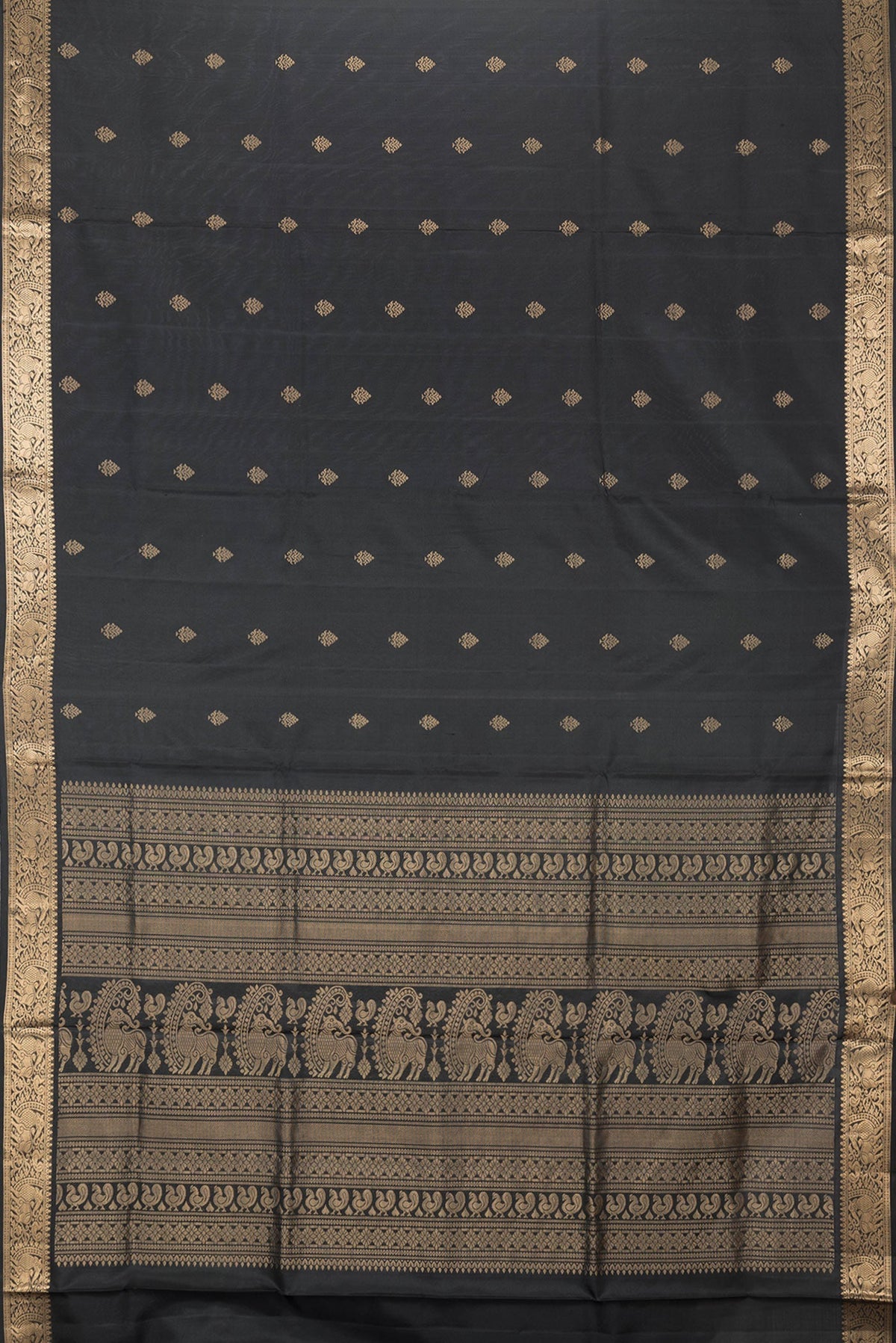 Flat view of Black Dual Tone Soft Silk Saree with Zari Butta on the body and Zari Border. 