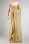 Dark Beige Dual Tone Soft Silk Saree with Zari Butta on the body and Zari Border displayed on a mannequin