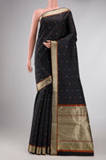 Black Dual Tone Kanchipuram Silk Saree with Thread Butta on the body and Thread Border displayed on a mannequin