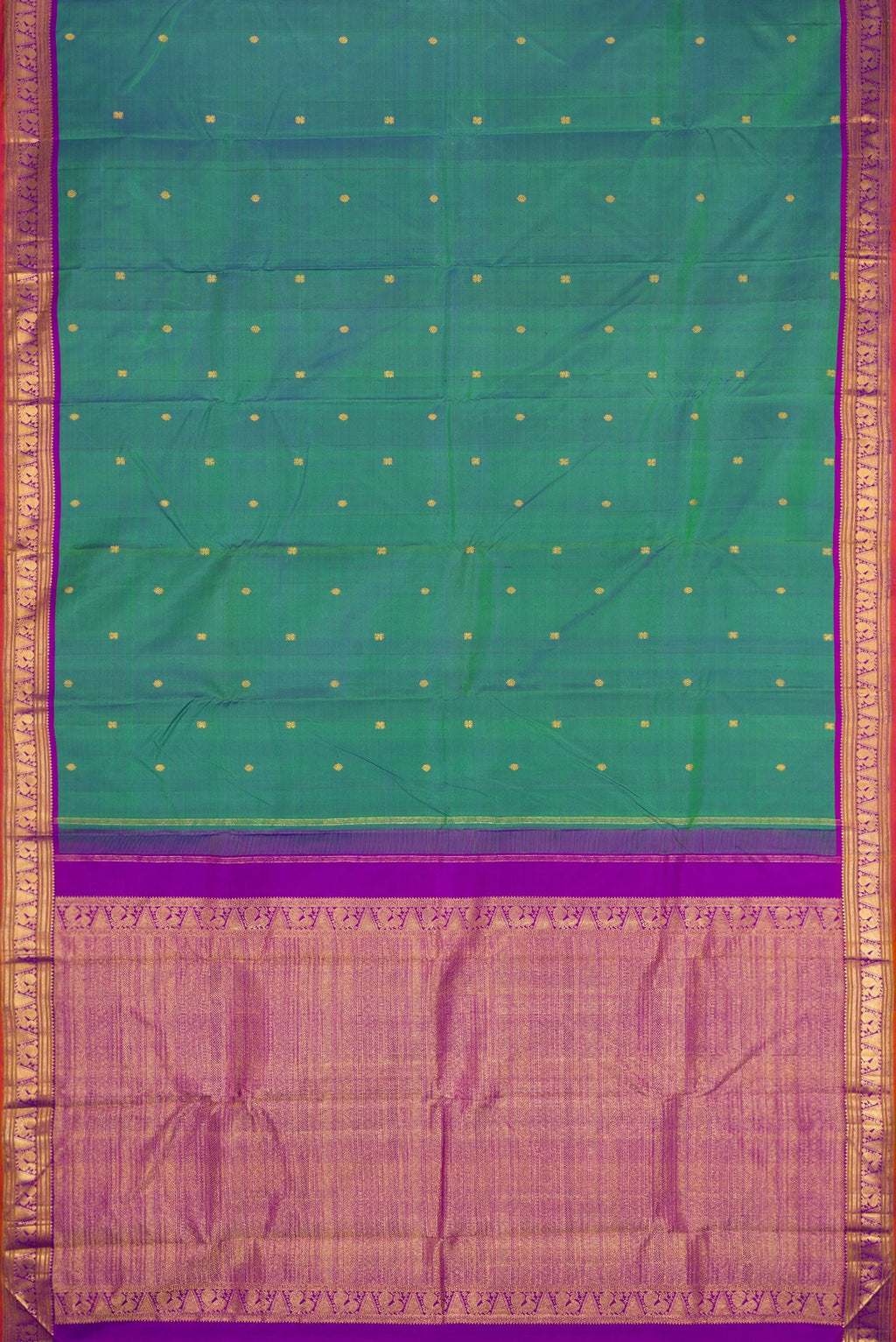 Flat view of Peacock Blue Dual Tone Kanchipuram Silk Saree with Zari Butta on the body and Zari Border. 