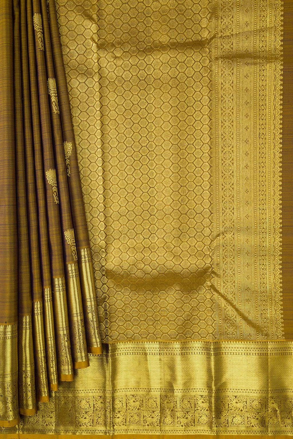 Pleats and pallu of Mehandi Green Dual Tone Kanchipuram Silk Saree with Zari Butta on the body and Zari Border. 