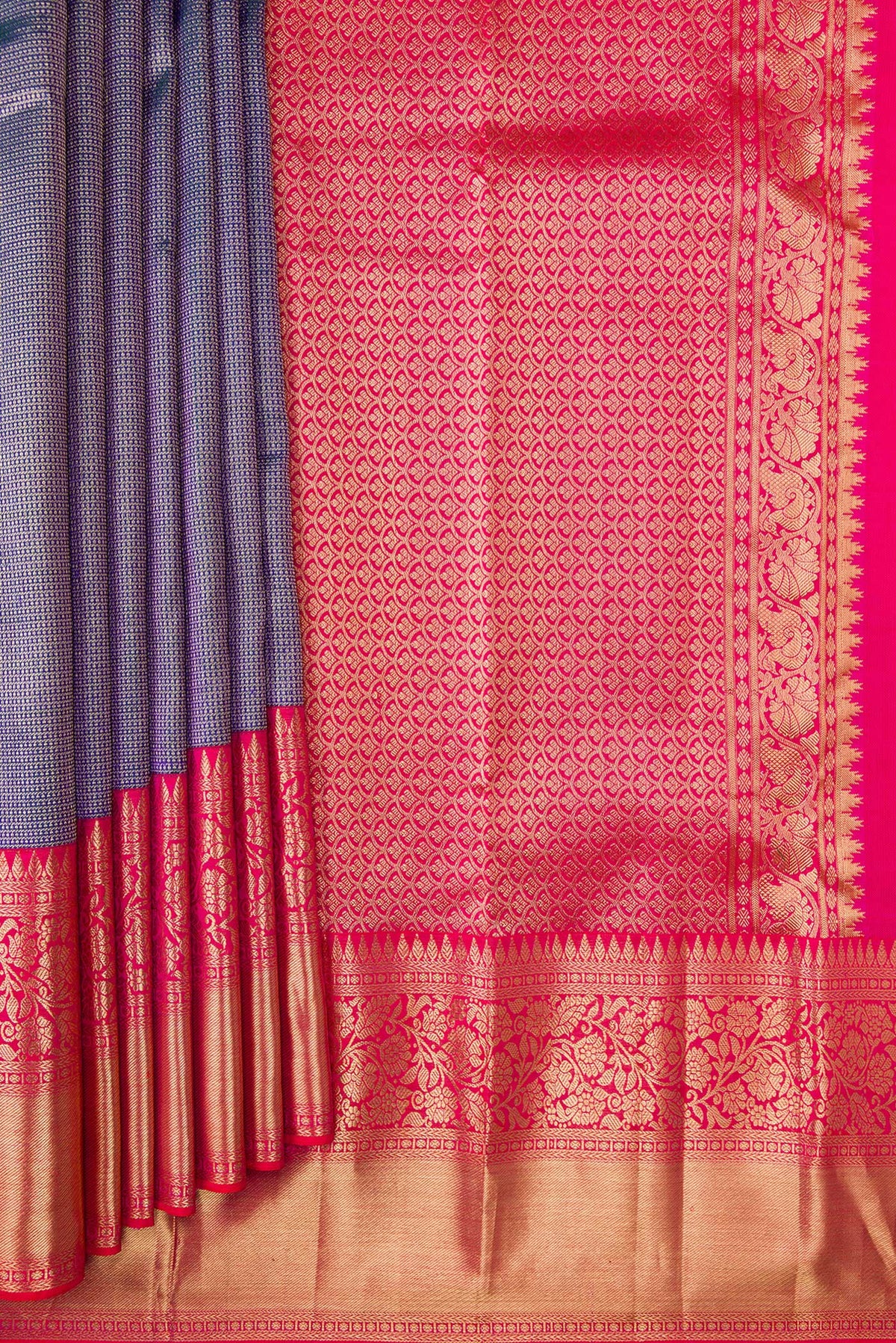 Pleats and pallu of Peacock Blue Dual Tone Kanjivaram Silk Saree with Zari Brocade on the body and Zari Border. 