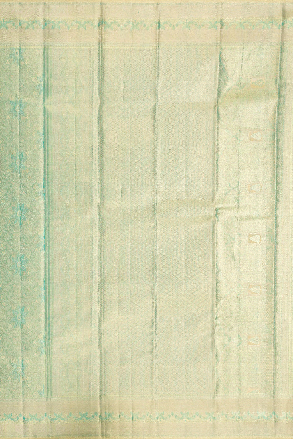 Close up image of the pallu of Green Dual Tone Kanjivaram Tissue Silk Saree with Zari Brocade on the body and Zari Border. 