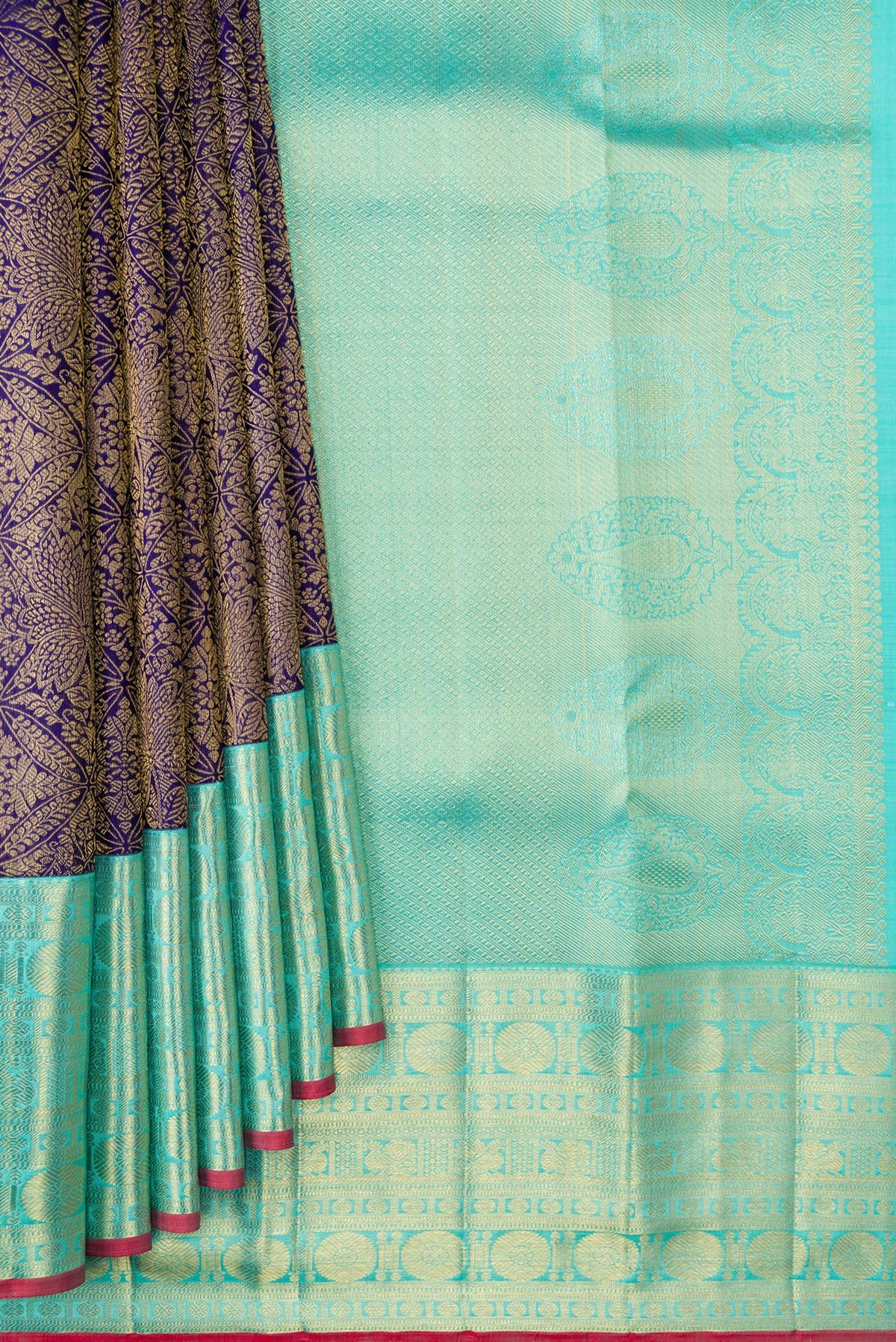 Pleats and pallu of Navy Blue Dual Tone Kanchipuram Silk Saree with Zari Brocade on the body and Zari Border. 
