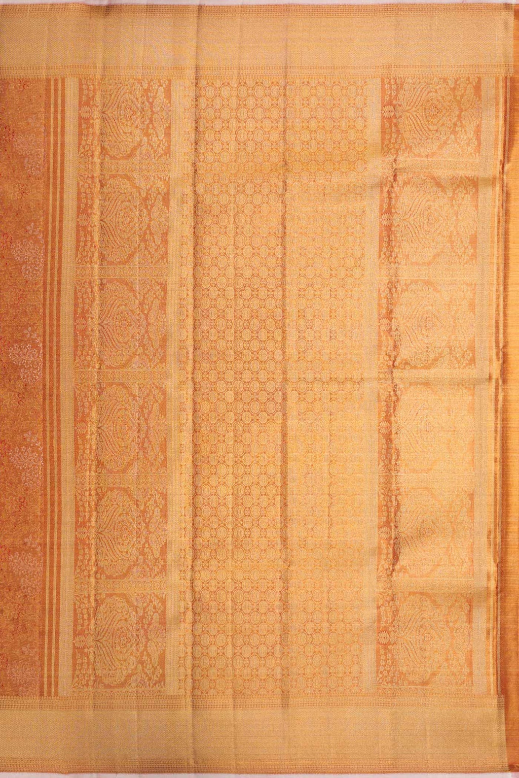 Close up image of the pallu of Gold Dual Tone Kanchipuram Silk Saree with Zari Brocade on the body and Zari And Thread Border