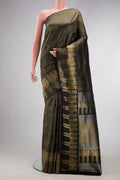 Black Dual Tone Kanjivaram Silk Saree with Zari Brocade on the body and Fancy Border.  displayed on a mannequin
