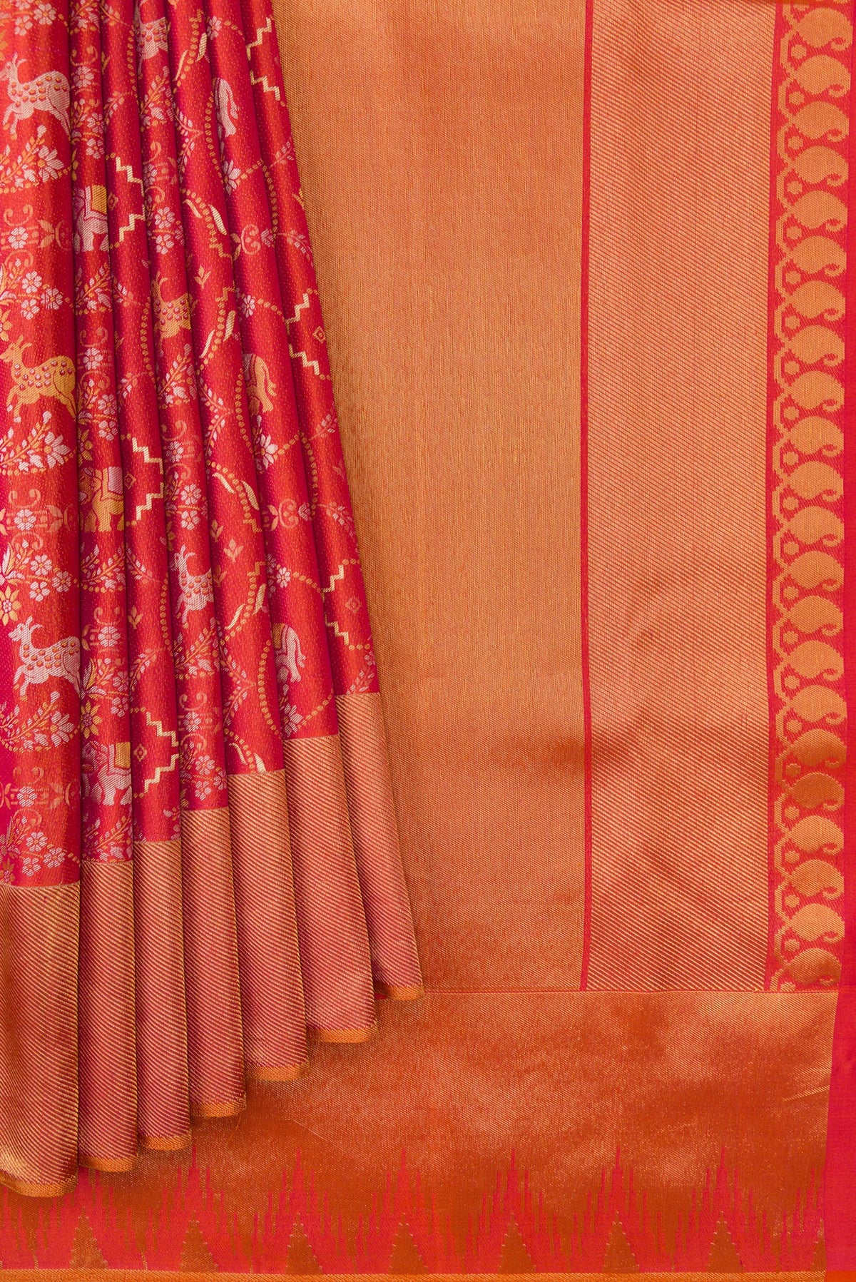 Pleats and pallu of Brick Orange Dual Tone Kanjivaram Silk Saree with Zari Brocade on the body and Zari Border. 