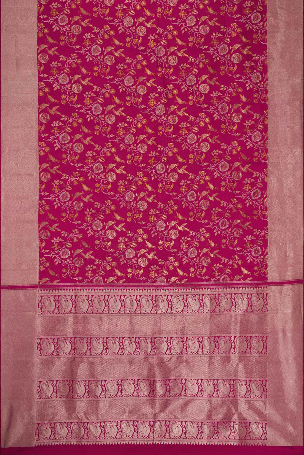 Flat view of Magenta Dual Tone Kanjivaram Silk Saree with Zari Brocade on the body and Zari Border. 