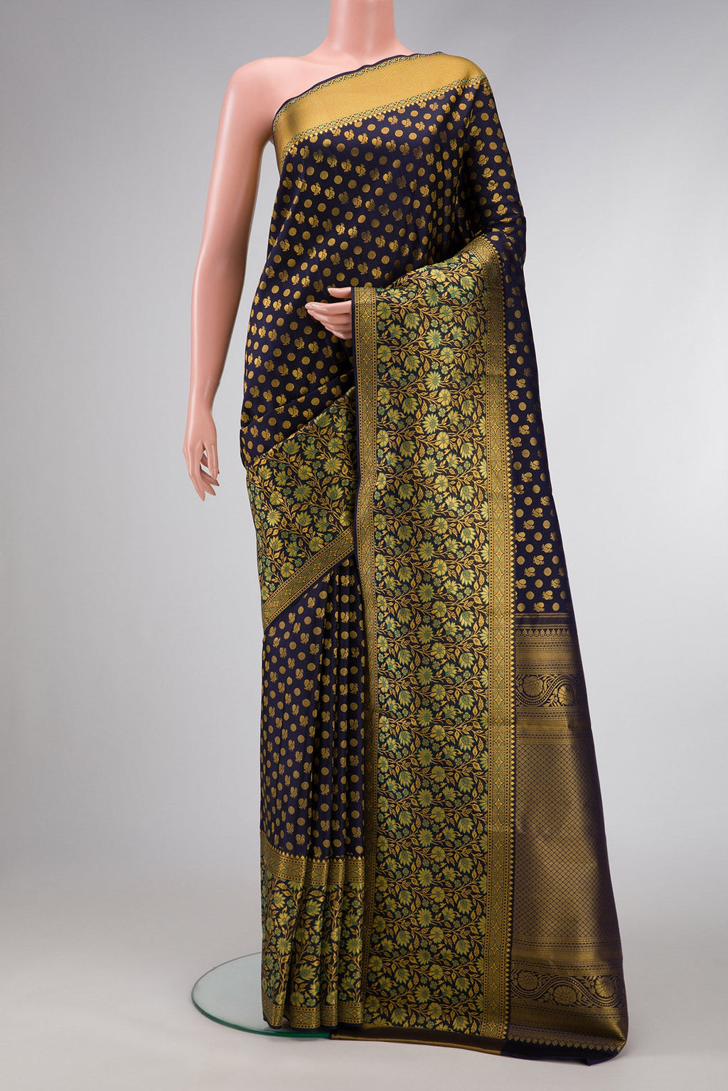 Navy Blue Dual Tone Kanjivaram Silk Saree with Zari Brocade on the body and Fancy Border.  displayed on a mannequin