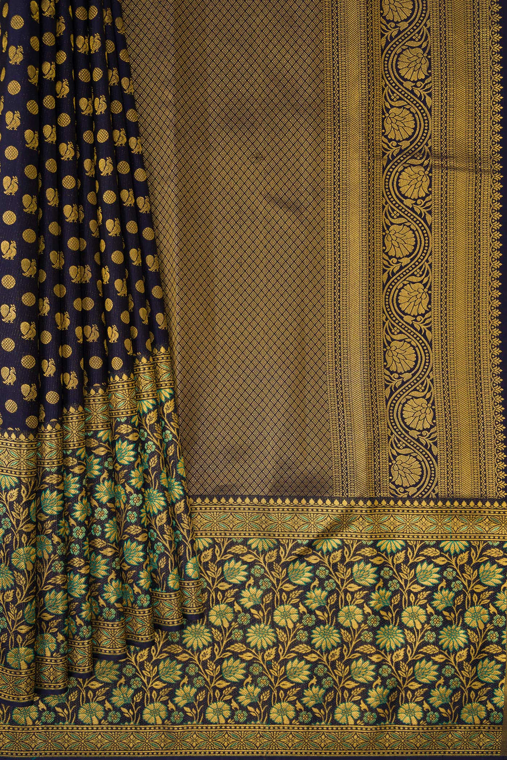 Pleats and pallu of Navy Blue Dual Tone Kanjivaram Silk Saree with Zari Brocade on the body and Fancy Border. 