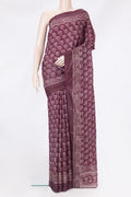 Purple Printed Silk Saree with Printed design on the body and Printed Border.  displayed on a mannequin
