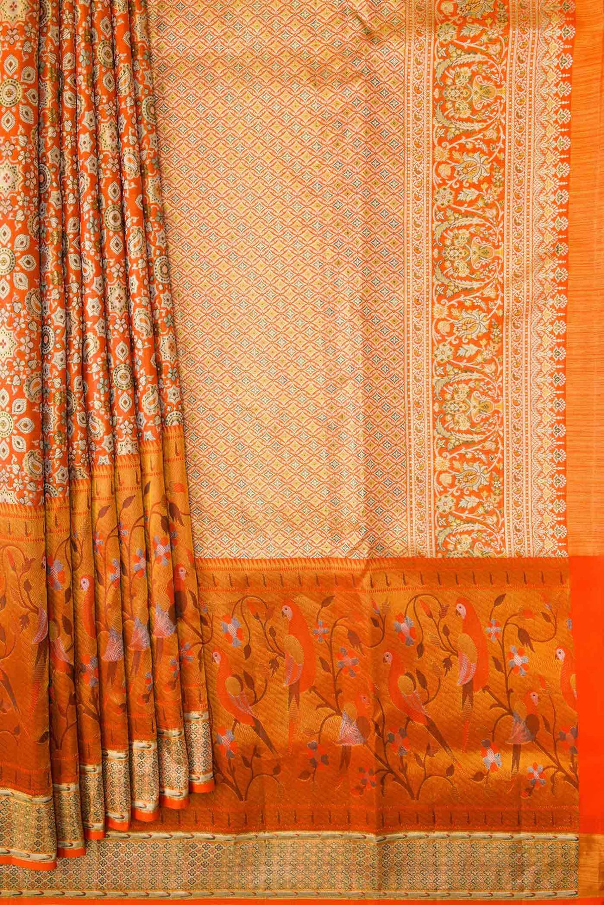 Pleats and pallu of Orange Dual Tone Kanchipuram Tissue Silk Saree with Zari Brocade on the body and Zari Border