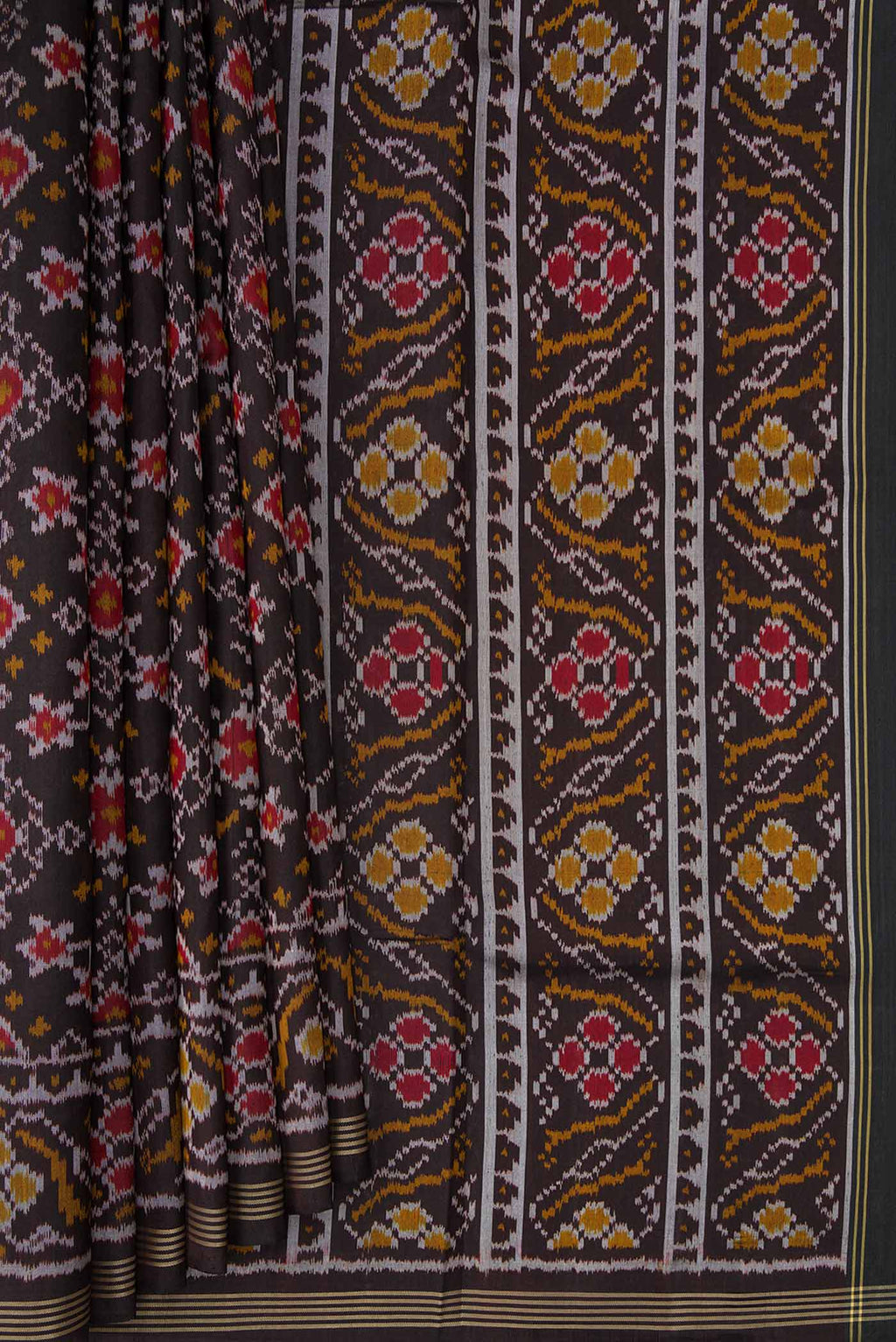 Pleats and pallu of Black Dual Tone Rajkot Patola Silk Saree with Ikat Print on the body and Zari Border. 