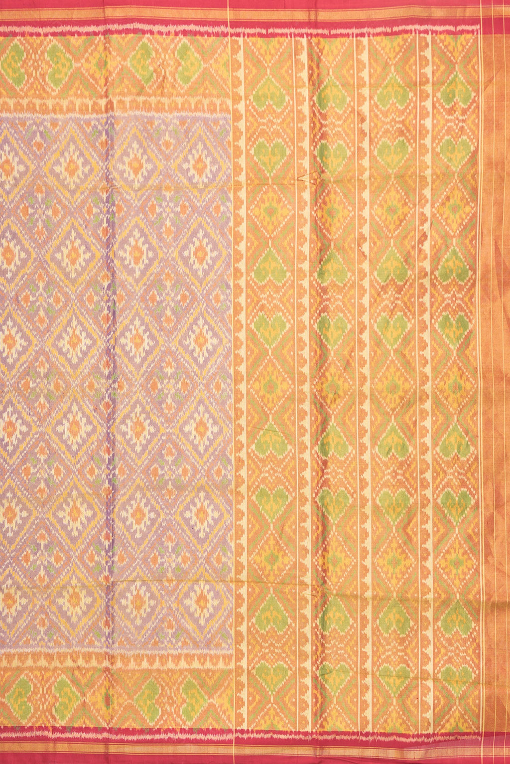 Close up image of the pallu of Lavender Dual Tone Double Ikat Saree with Ikat Print on the body and Zari Border. 