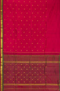 Maroon Dual Tone Kanchipuram Silk Saree with Zari Butta on the body and Zari Border.  displayed on a mannequin