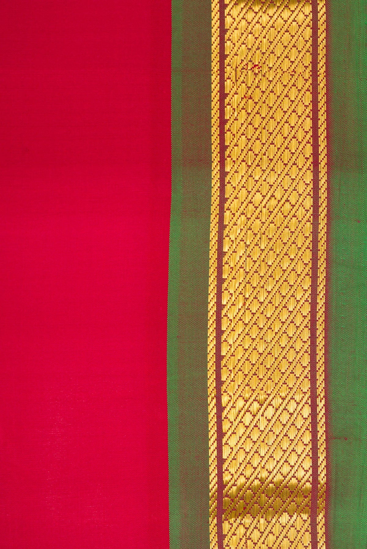 Border image of Maroon Dual Tone Kanchipuram Silk Saree with Plain Body and Zari Border. 