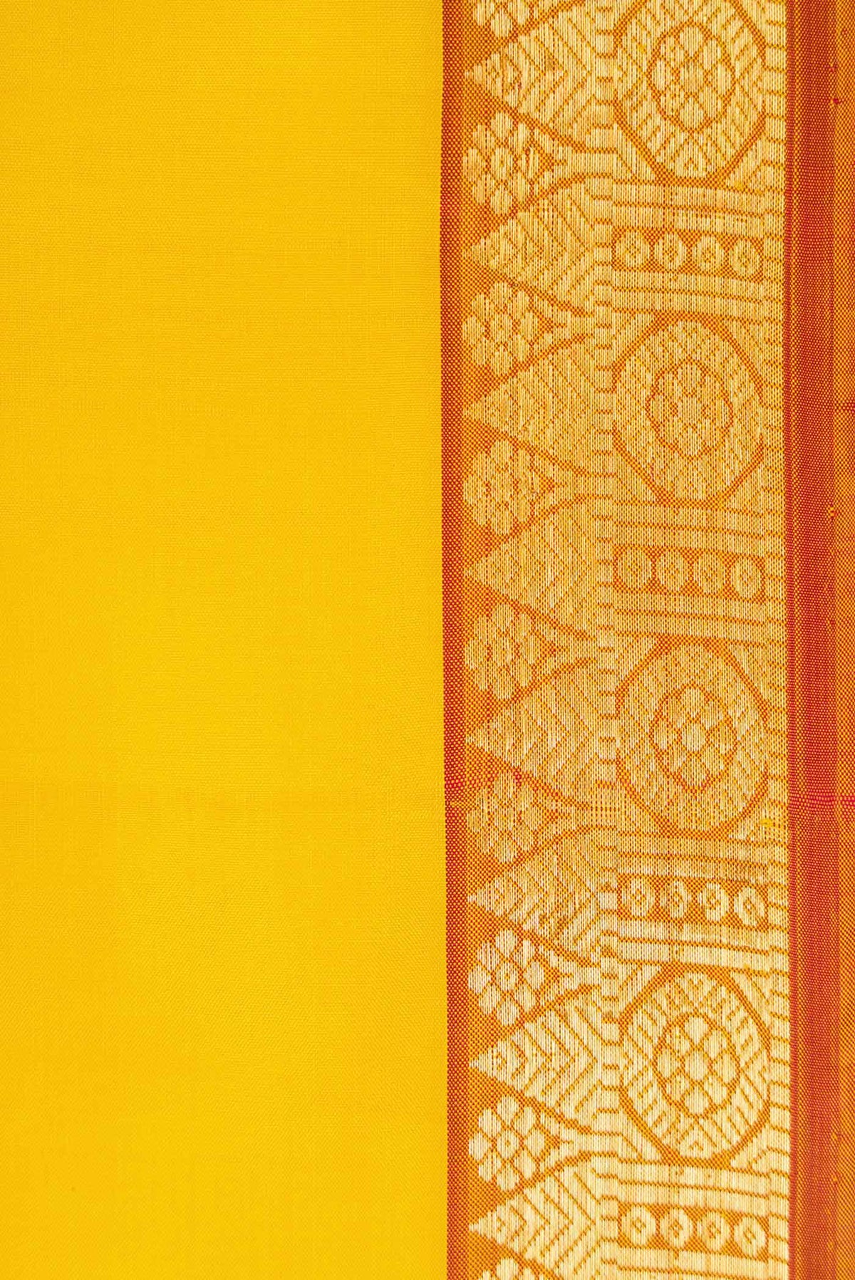 Border image of Lemon Yellow Dual Tone Kanjivaram Silk Saree with Plain Body and Zari Border. 