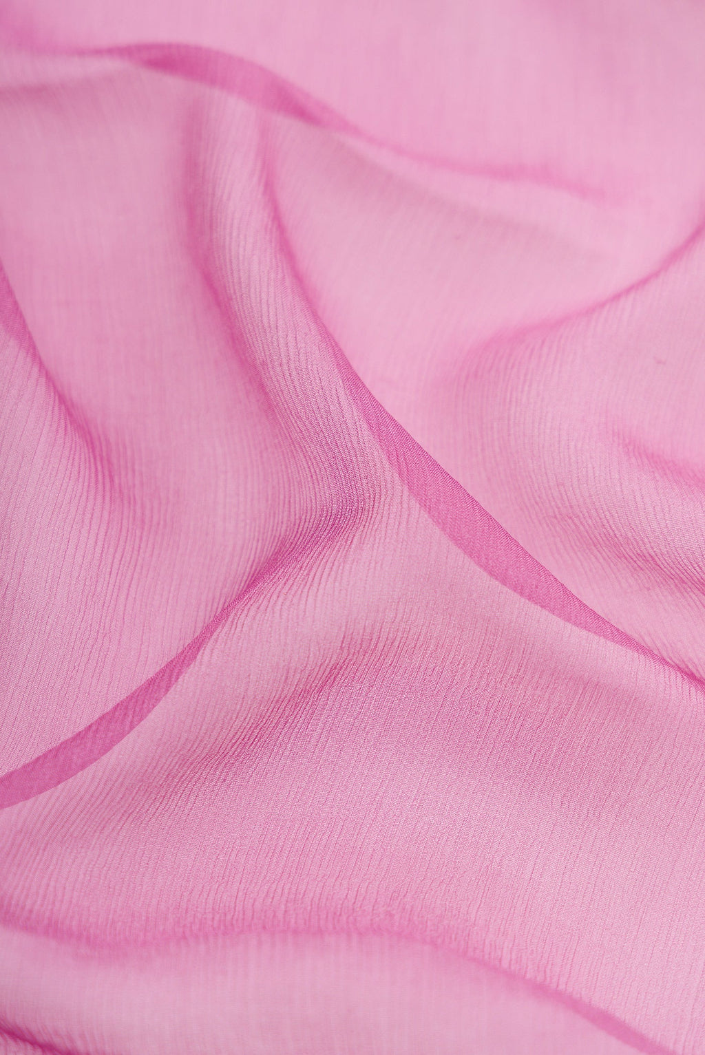 Close up of Lavender Mysore Chiffon Saree with Plain Body and Zari Border.  displaying folds