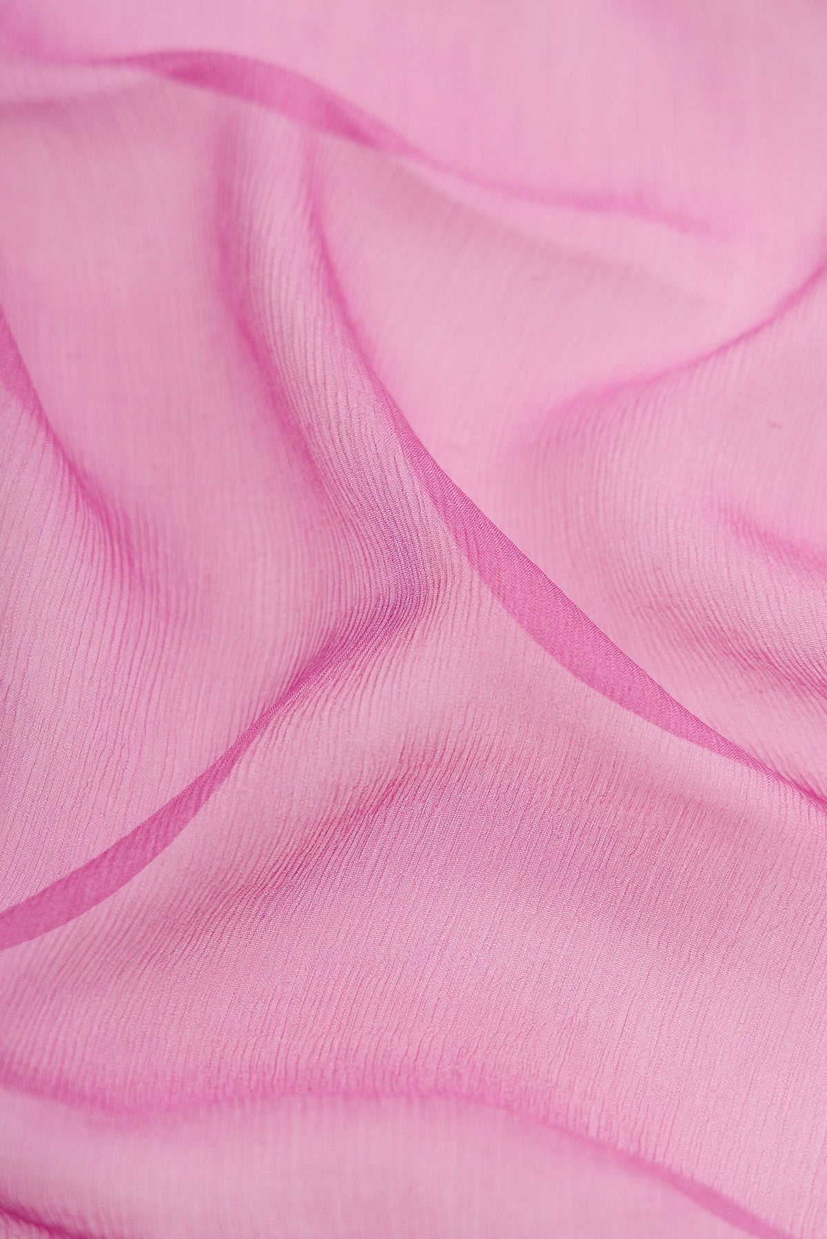 Close up of Lavender Mysore Chiffon Saree with Plain Body and Zari Border.  displaying folds