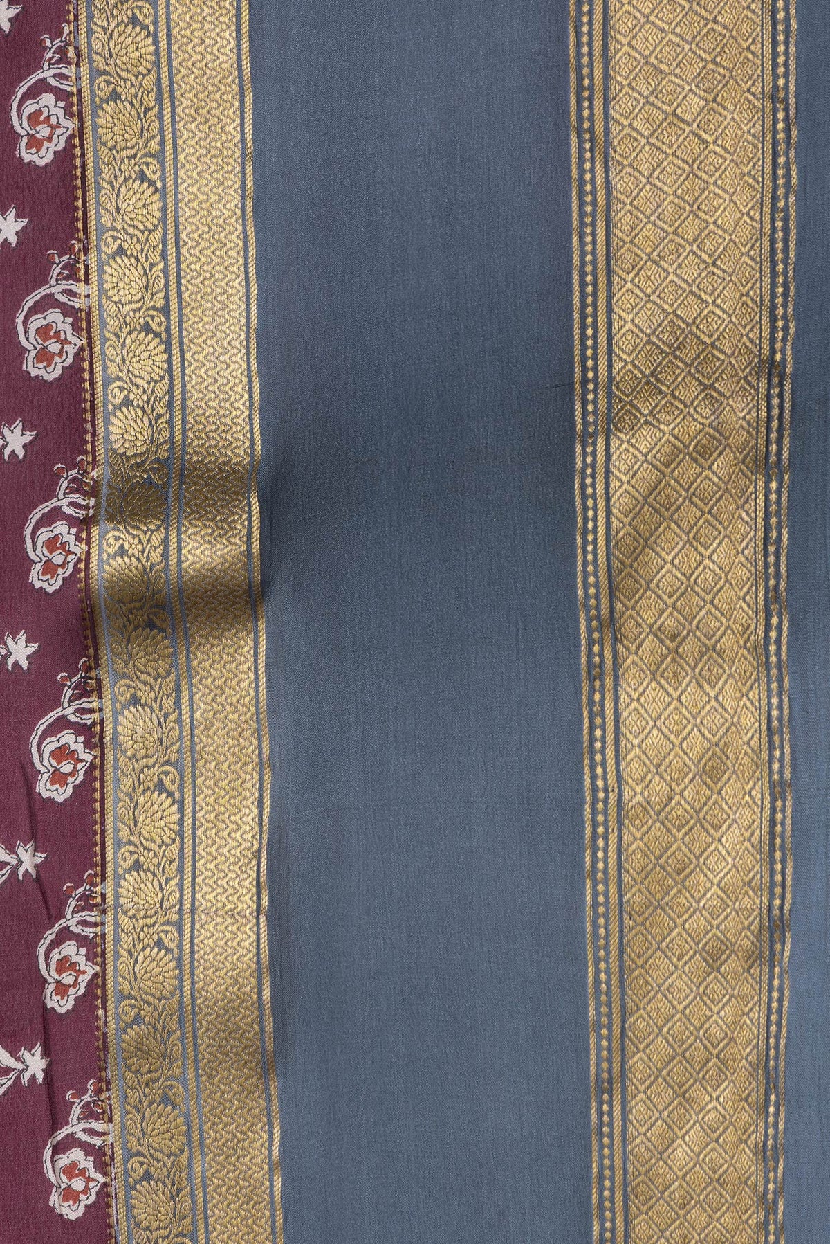Border image of Maroon Dual Tone Mysore Crepe Saree with Printed design on the body and Zari Border. 