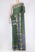 Green Dual Tone Mysore Crepe Saree with Printed design on the body and Zari Border.  displayed on a mannequin