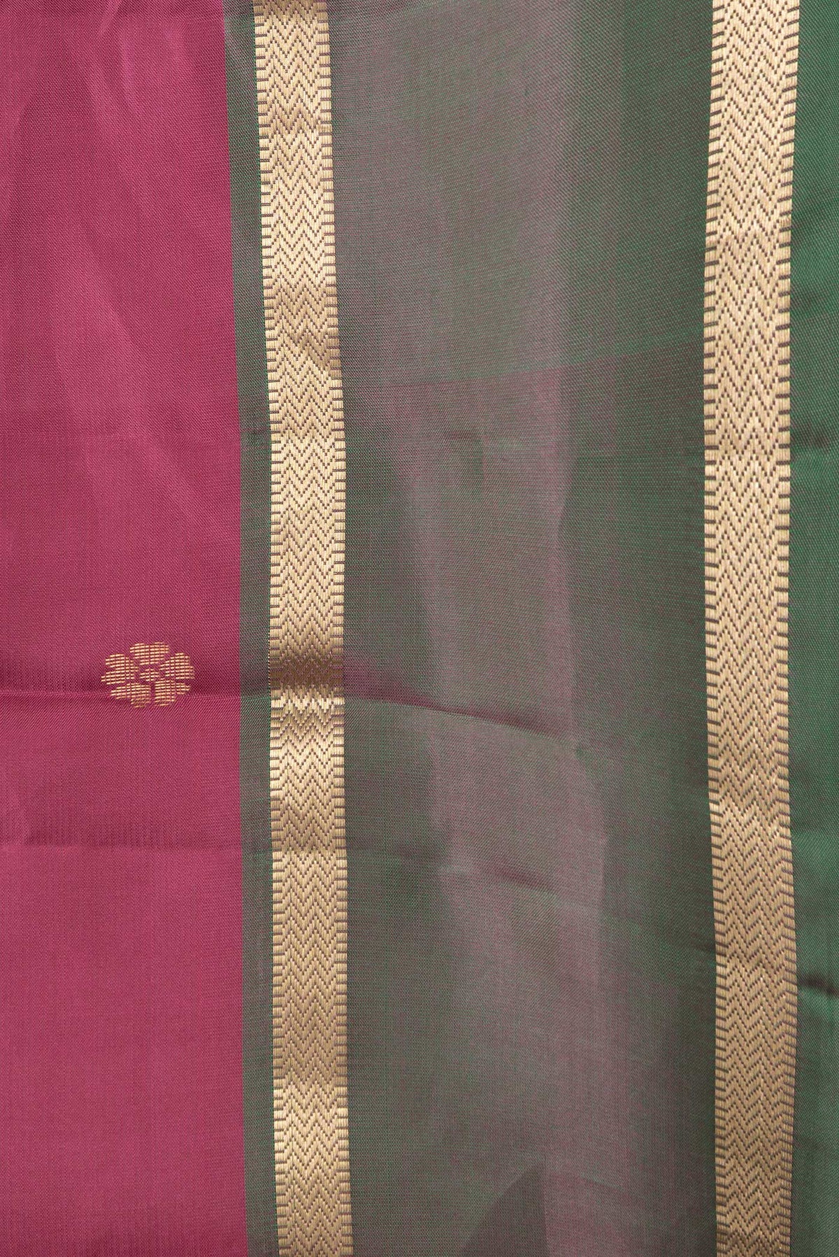Border image of Dark Pink Dual Tone Kanjivaram Silk Saree with Zari Butta on the body and Zari Border. 
