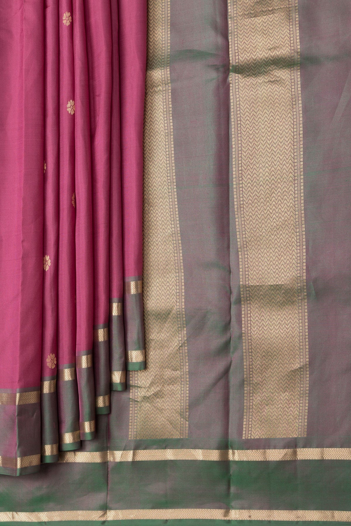 Pleats and pallu of Dark Pink Dual Tone Kanjivaram Silk Saree with Zari Butta on the body and Zari Border. 