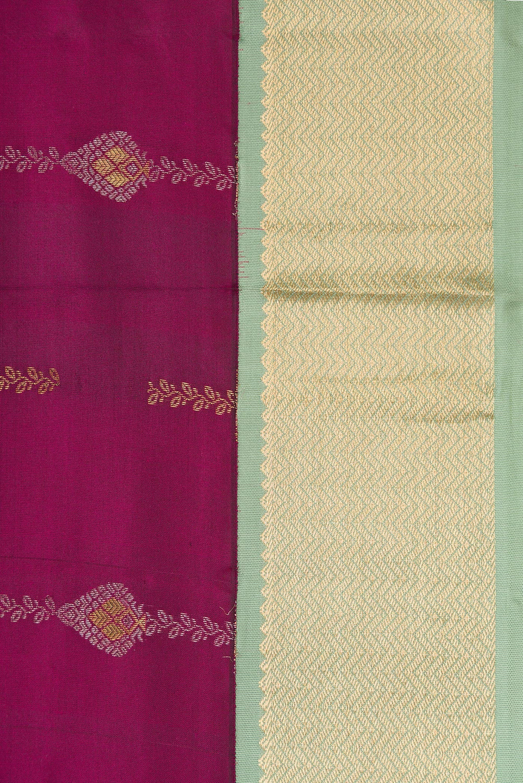 Border image of Magenta Dual Tone Kanchipuram Silk Saree with Zari Butta on the body and Zari Border. 