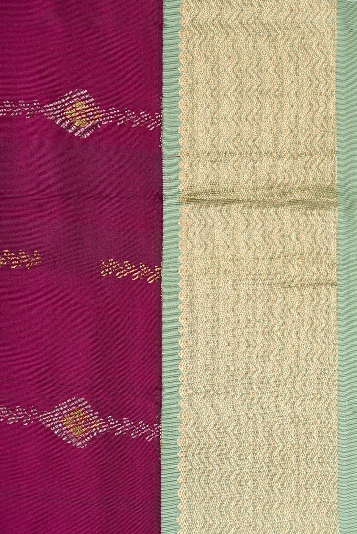 Border image of Magenta Dual Tone Kanchipuram Silk Saree with Zari Butta on the body and Zari Border. 