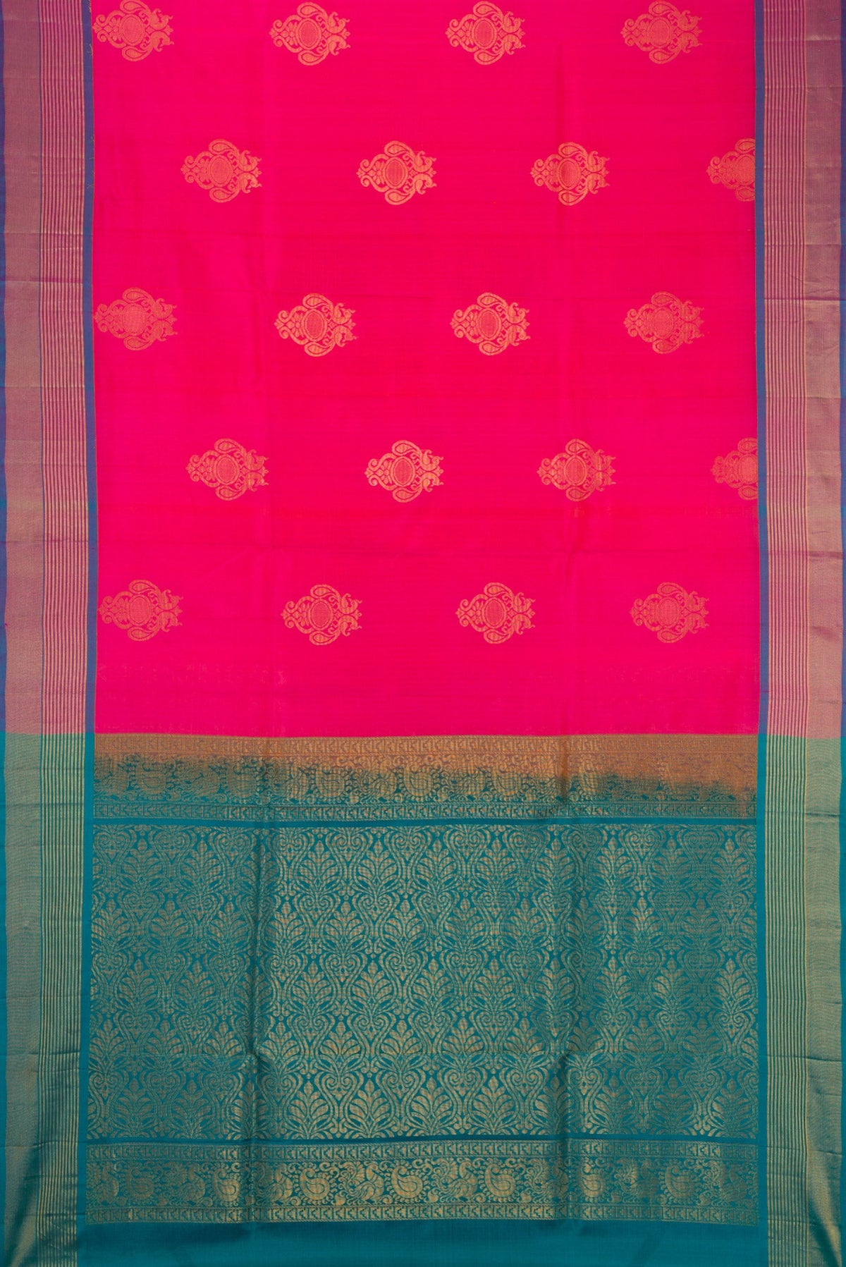 Pink Soft Silk Saree with Zari Butta on the body and Zari Border.  displayed on a mannequin