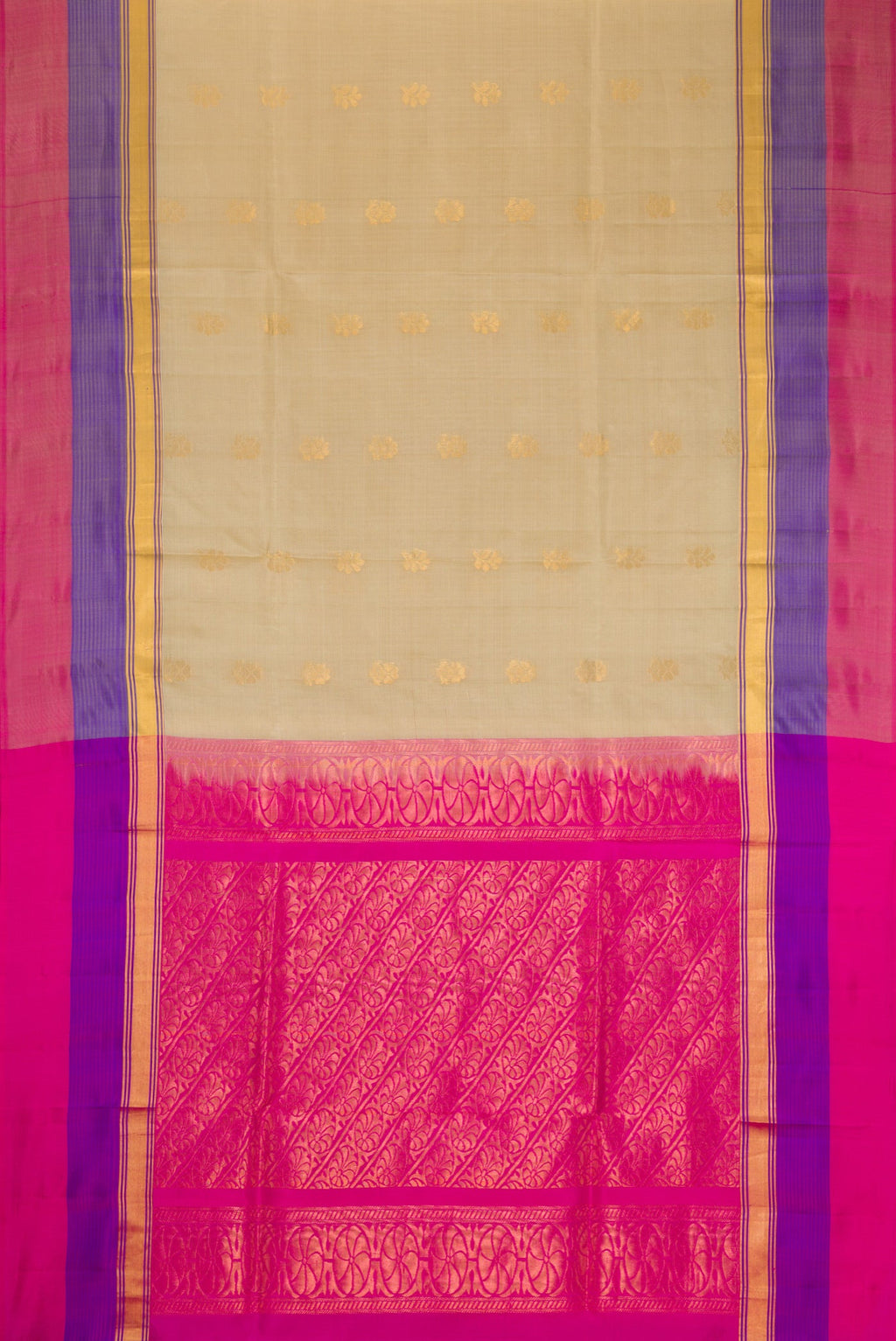 Flat view of Beige Soft Silk Saree with Zari Butta on the body and Zari Border. 