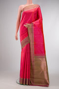 Pink Dual Tone Kanchipuram Silk Saree with Stripes on the body and Zari Border.  displayed on a mannequin