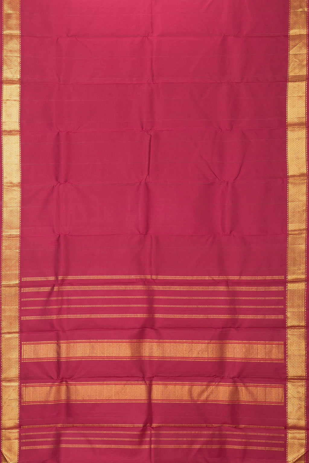 Flat view of Maroon Dual Tone Kanchipuram Silk Saree with Plain Body and Zari Border. 