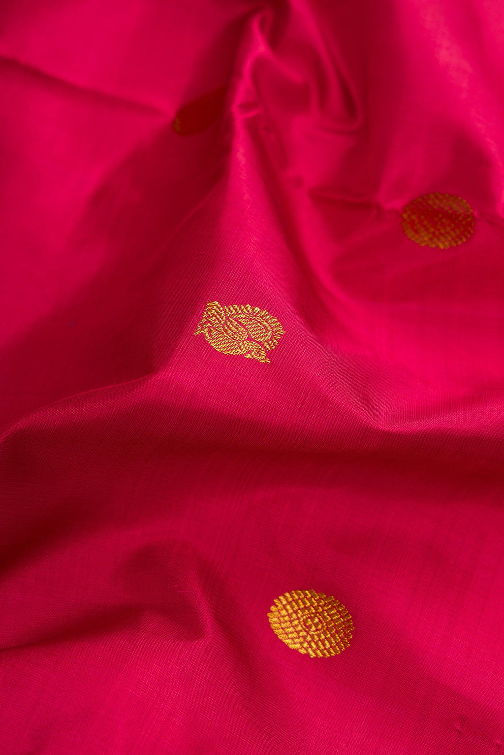Close up of Maroon Dual Tone Kanchipuram Silk Nine Yards Saree with Zari Butta on the body and Zari Border.  displaying folds