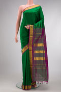 Bottle Green Dual Tone Kanchipuram Silk Nine Yards Saree with Plain Body and Zari Border.  displayed on a mannequin