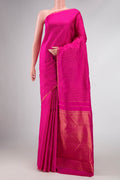 Pink Dual Tone Kanchipuram Silk Saree with Stripes on the body and Zari Border.  displayed on a mannequin