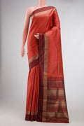 Orange Dual Tone Kanchipuram Silk Saree with Checked design on the body and Zari Border.  displayed on a mannequin