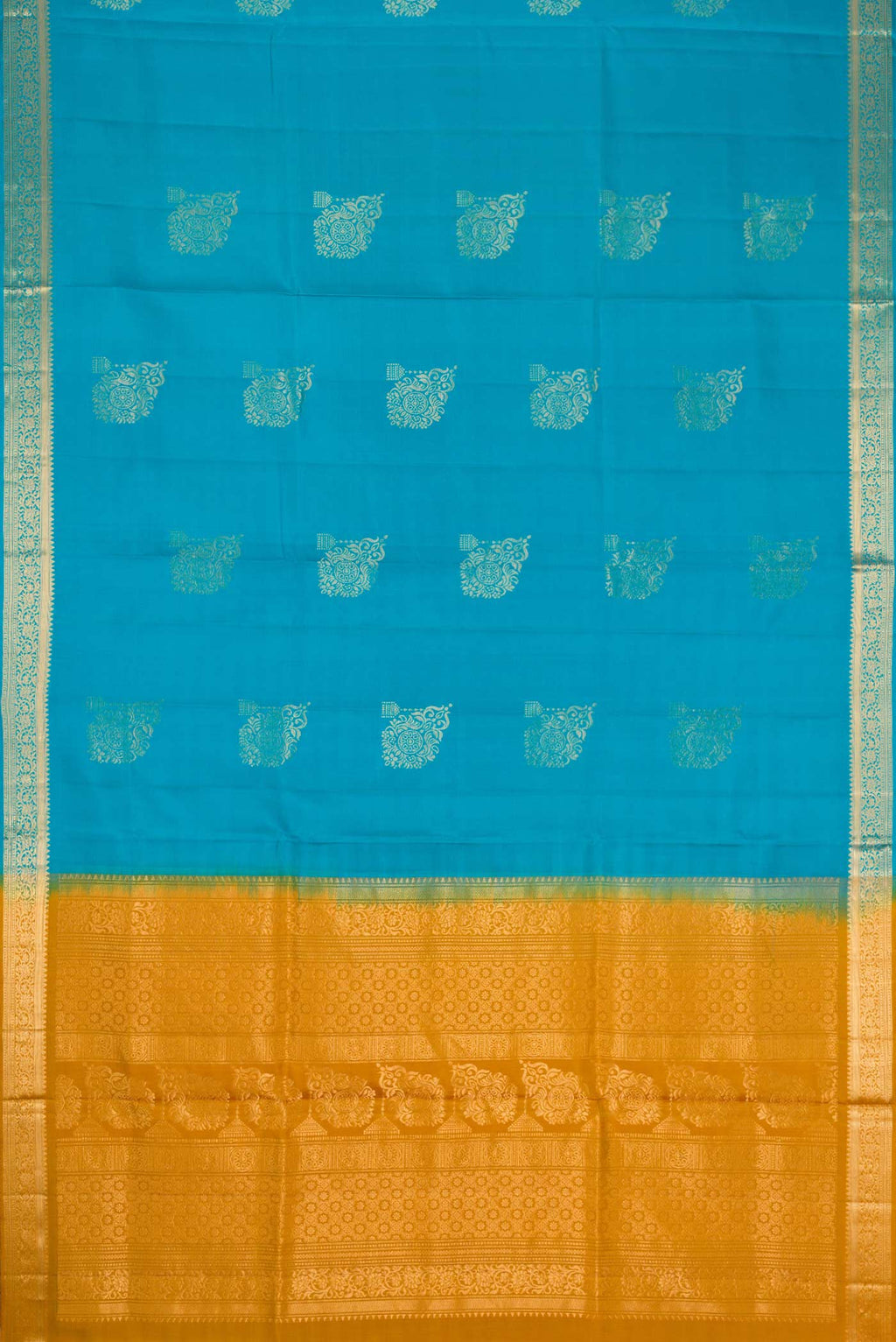 Flat view of Sky Blue Dual Tone Soft Silk Saree with Zari Butta on the body and Zari Border. 