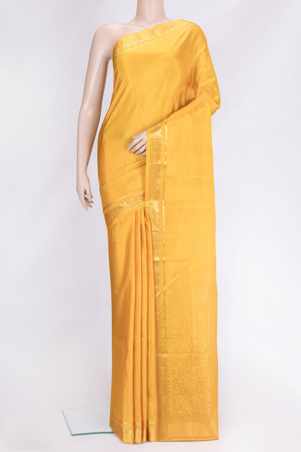 Yellow Dual Tone Soft Silk Saree with Zari Butta on the body and Zari Border.  displayed on a mannequin