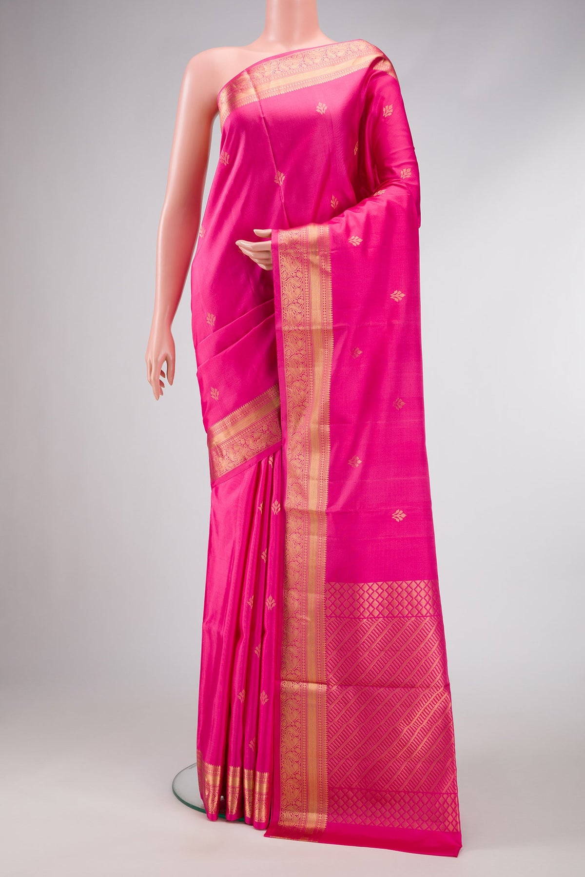 Pink Dual Tone Soft Silk Saree with Zari Butta on the body and Zari Border.  displayed on a mannequin