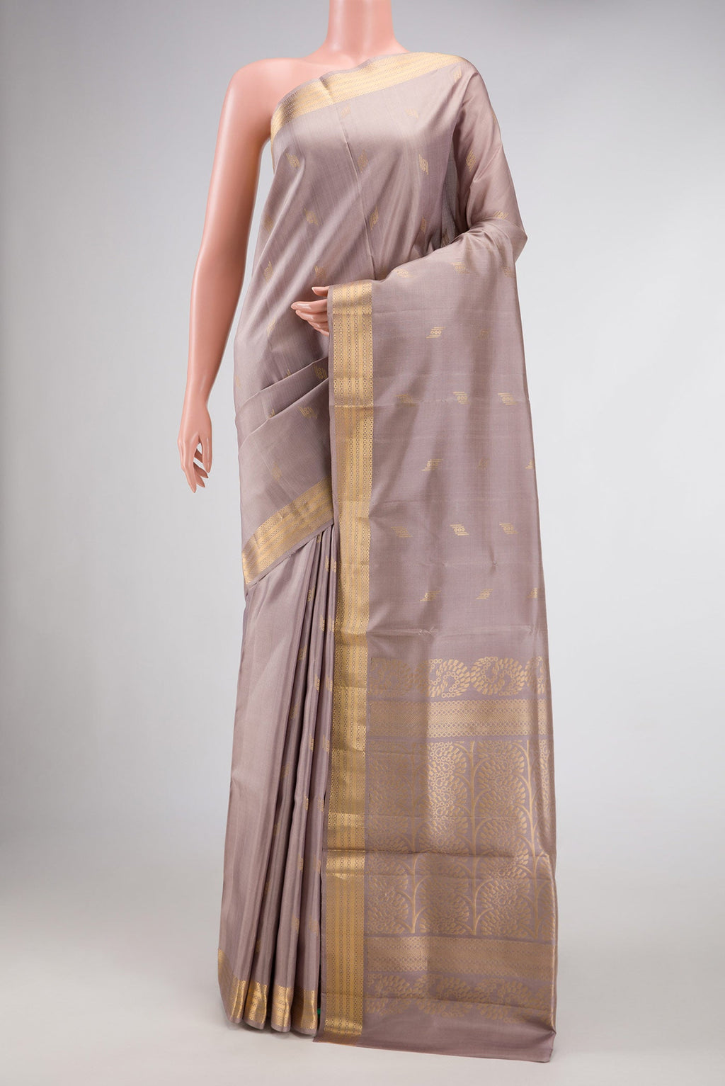 Grey Dual Tone Soft Silk Saree with Zari Butta on the body and Zari Border.  displayed on a mannequin