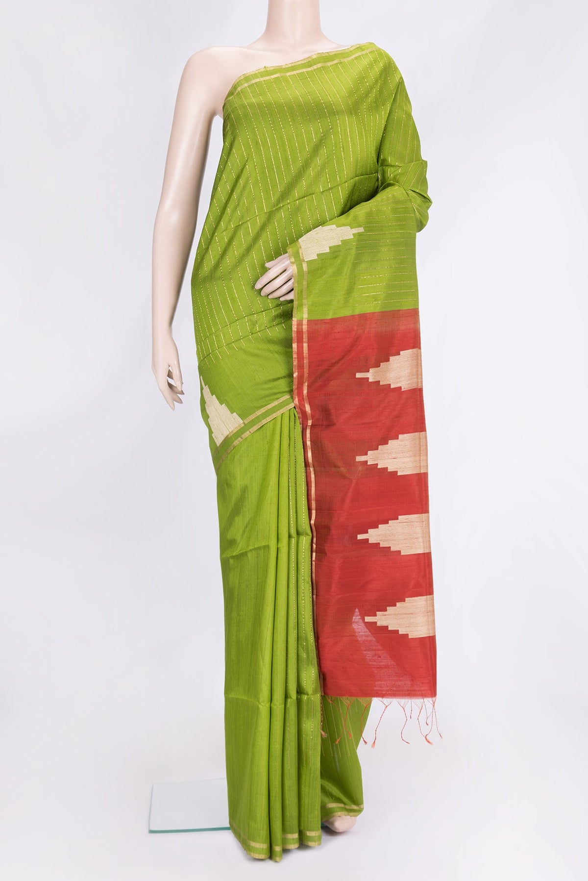 Green Dual Tone Raw Silk Saree with Stripes on the body and Temple Border.  displayed on a mannequin