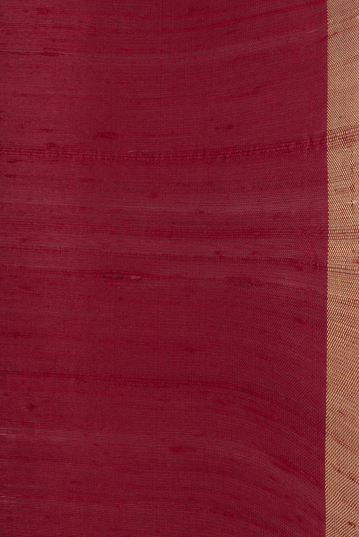 Border image of Maroon Dual Tone Raw Silk Saree with Plain Body and Thin Zari Line. 