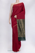 Maroon Dual Tone Raw Silk Saree with Plain Body and Thin Zari Line.  displayed on a mannequin